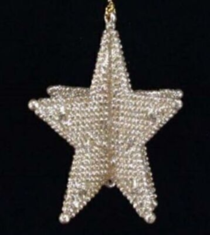 Pale Oyster Gold 3D Star Christmas Tree Decoration by Gisela Graham. Bead effect 5 point 3D star. Hanging Christmas Tree Decoration. This tasteful gold star is a really popular line and has been part of our best sellers list for years. Size 9x8x8cm<br><br>
If it is Christmas Tree Decorations to be sent anywhere in the UK you are after than look no further than Booker Flowers and Gifts Liverpool UK. Our Tree Decorations are specially selected from across a range of suppliers. This way we can bring you the very best of what is available in Tree Decorations.<br><br>
Here at Booker Flowers and Gifts we love Christmas and as such we have a massive range of traditional and contemporary Christmas Decorations.<br><br>

Gisela loves Christmas Gisela Graham Limited is one of Europes leading giftware design companies. Gisela made her name designing exquisite Christmas and Easter decorations. However she has now turned her creative design skills to designing pretty things for your kitchen, home and garden. She has a massive range of over 4500 products of which Gisela is personally involved in the design and selection of. In their own words Gisela Graham Limited are about marking special occasions and celebrations. Such as Christmas, Easter, Halloween, birthday, Mothers Day, Fathers Day, Valentines Day, Weddings Christenings, Parties, New Babies. All those occasions which make life special are beautifully celebrated by Gisela Graham Limited.<br><br>
Christmas and her love of this occasion is what made her company Gisela Graham Limited come to fruition. Every year she introduces completely new Christmas Collections with Unique Christmas decorations. Gisela Grahams Christmas ranges appeal to all ages and pockets.<br><br>
Gisela Graham Christmas Tee Decorations are second not none a really large collection of very beautiful items she is especially famous for her Fairies and Nativity. If it is really beautiful and charming Christmas Decorations you are looking for think no further than Gisela Graham.<br><br>
This Beautiful Gold Glitzy Star by Gisela Graham is a stylish addition to any Christmas Tree it will fit into many Christmas Themes and is sure to be a favorite for years to come. Remember Booker Flowers and Gifts for Gisela Graham Tree Decorations that can be send anywhere in the UK.
